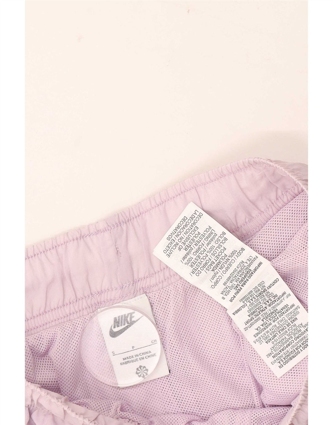 Nike - Pantalones cortos deportivos para mujer (talla 8), color morado, poliéster
