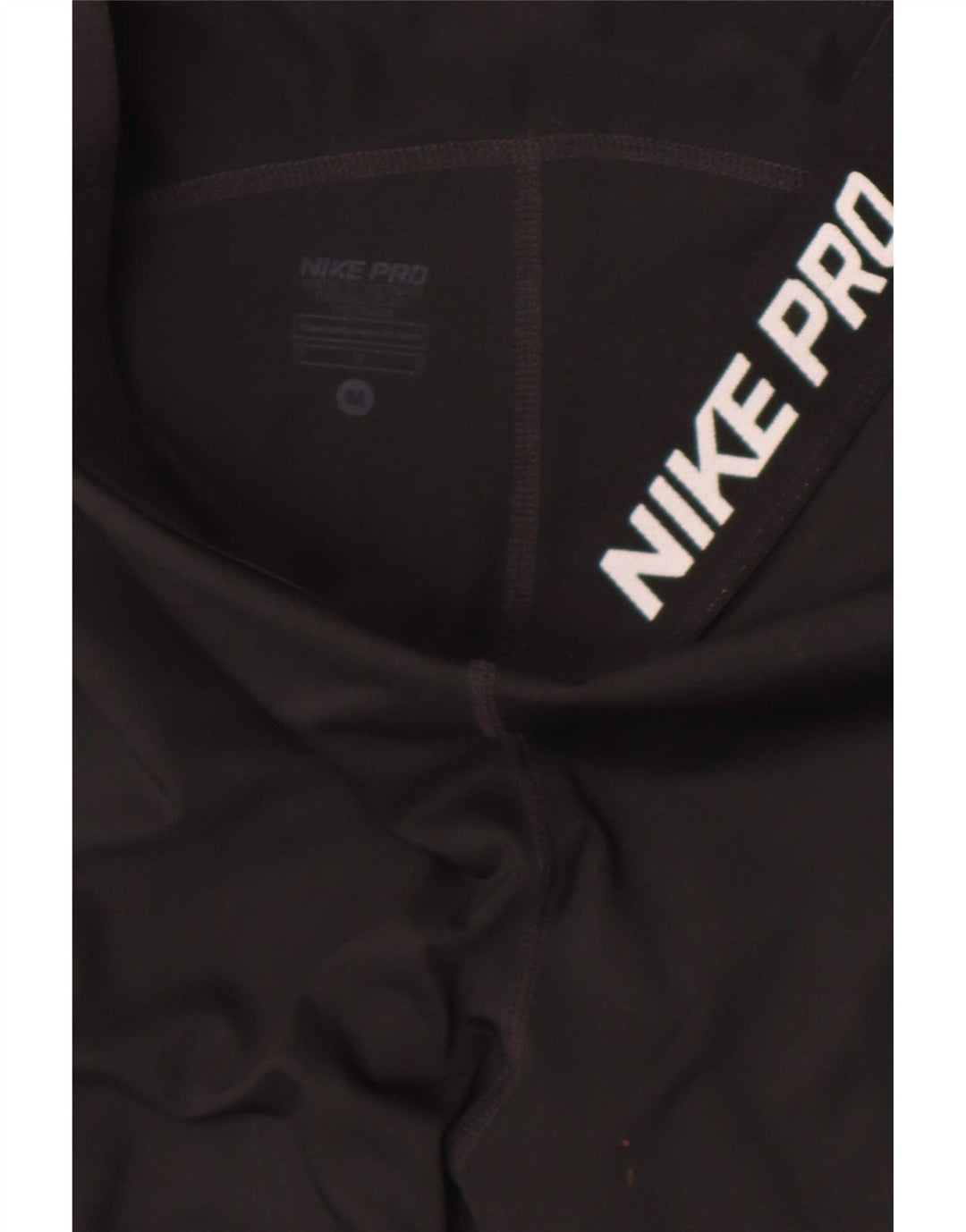 Nike - Leggings capri Dri Fit para mujer, talla M, color negro
