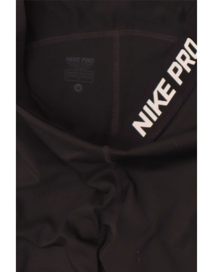 Nike - Leggings capri Dri Fit para mujer, talla M, color negro