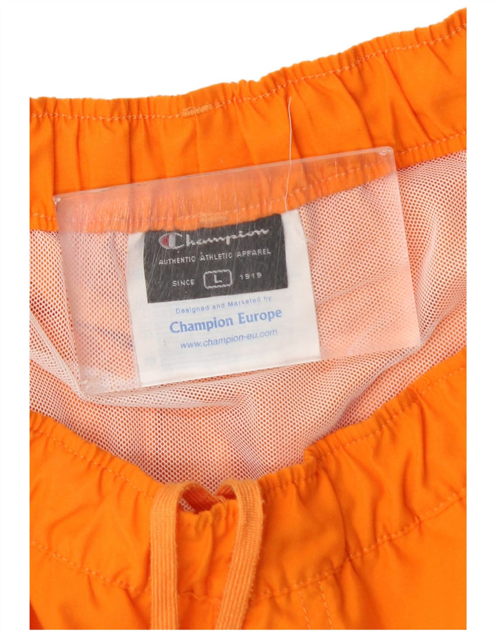 Champion Bañador con estampado gráfico para hombre, poliéster con bloques de color naranja grande