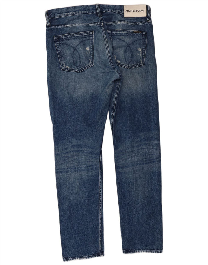 Calvin Klein Jeans ajustados desgastados para hombre W34 L32 Azul