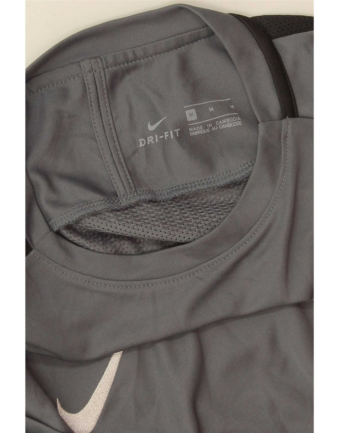 Camiseta Nike Dri Fit para hombre con bloques de color gris medio