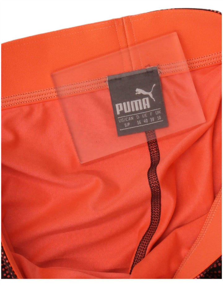 Puma Leggings Capri con patrón abstracto para mujer, talla 40, talla pequeña, multicolor