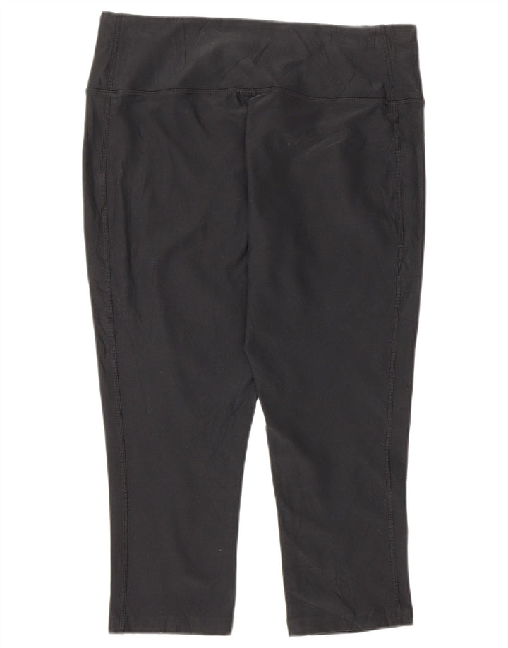 Nike - Leggings capri Dri Fit para mujer, talla M, poliéster negro