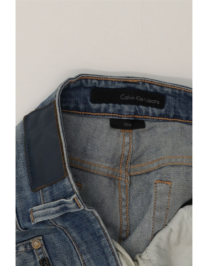 CALVIN KLEIN Vaqueros ajustados desgastados para hombre W34 L30 Azul