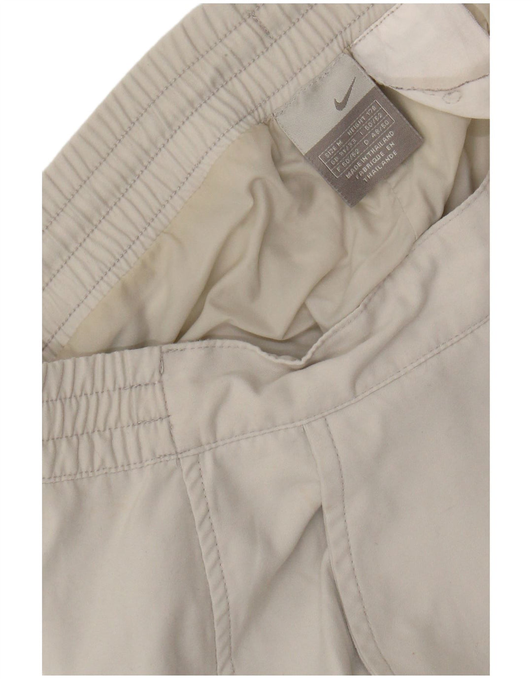 Pantalón cortavientos NIKE para hombre mediano W32 L31 blanco color block
