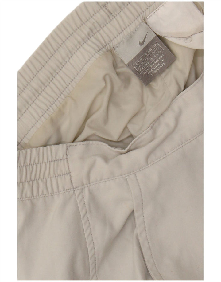 Pantalón cortavientos NIKE para hombre mediano W32 L31 blanco color block