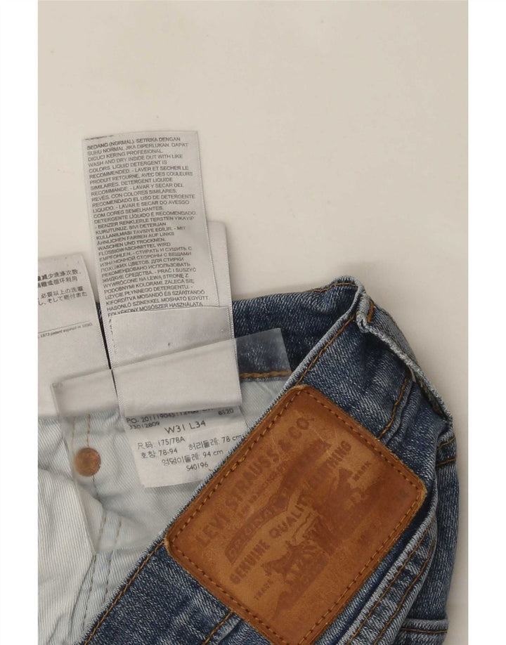 Vaqueros ajustados desgastados para hombre Levi's W31 L29 Algodón azul