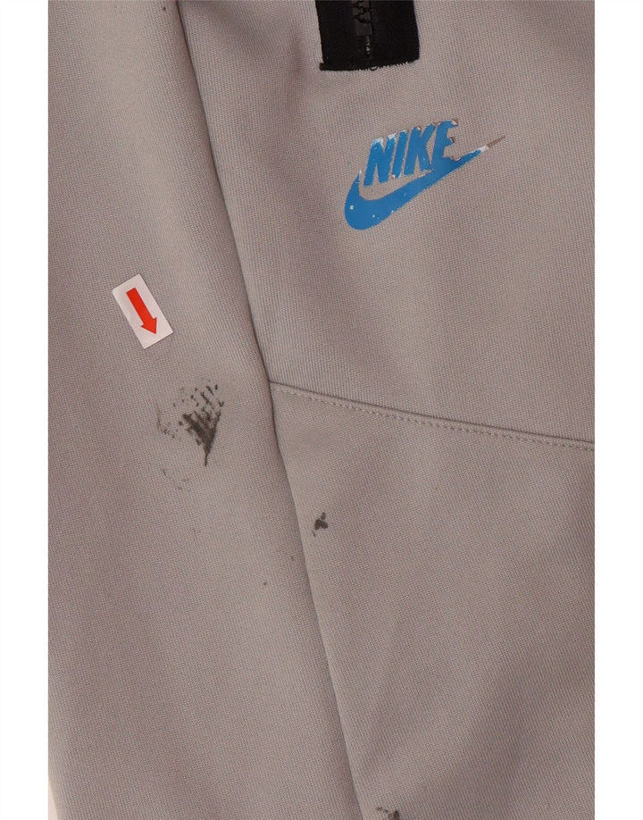 NIKE Hombre Pantalones de Chándal Joggers Gris Medio Poliéster