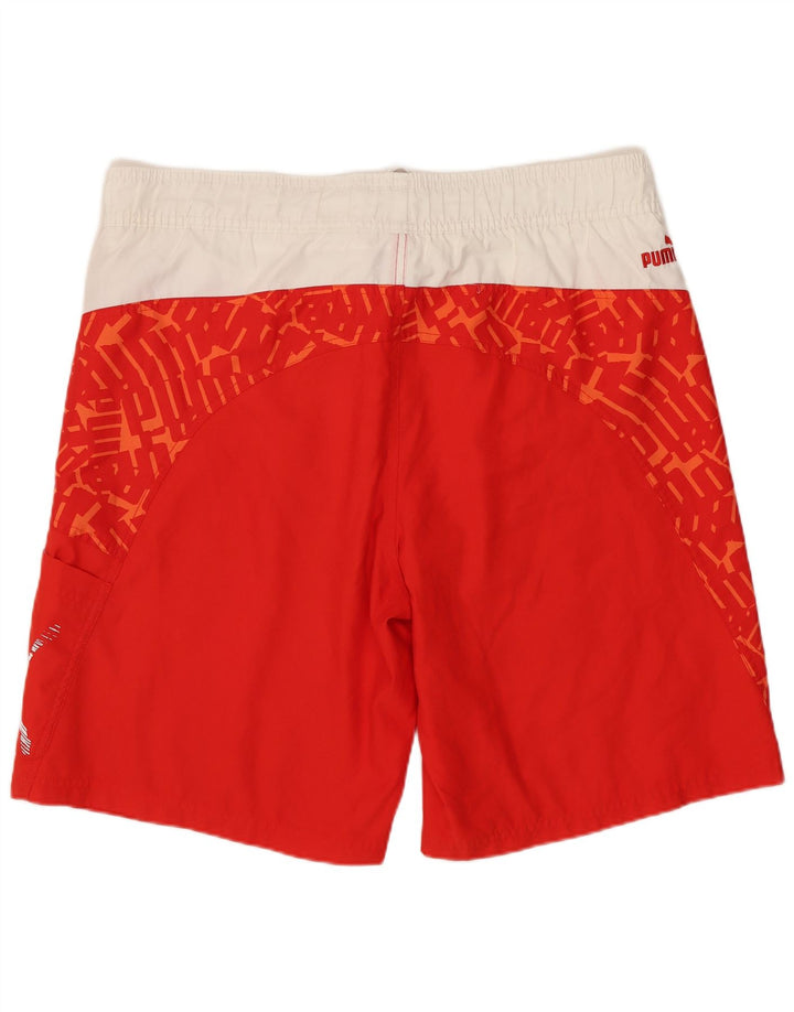 Puma Bañador con estampado gráfico para hombre, Poliéster color block, color rojo medio