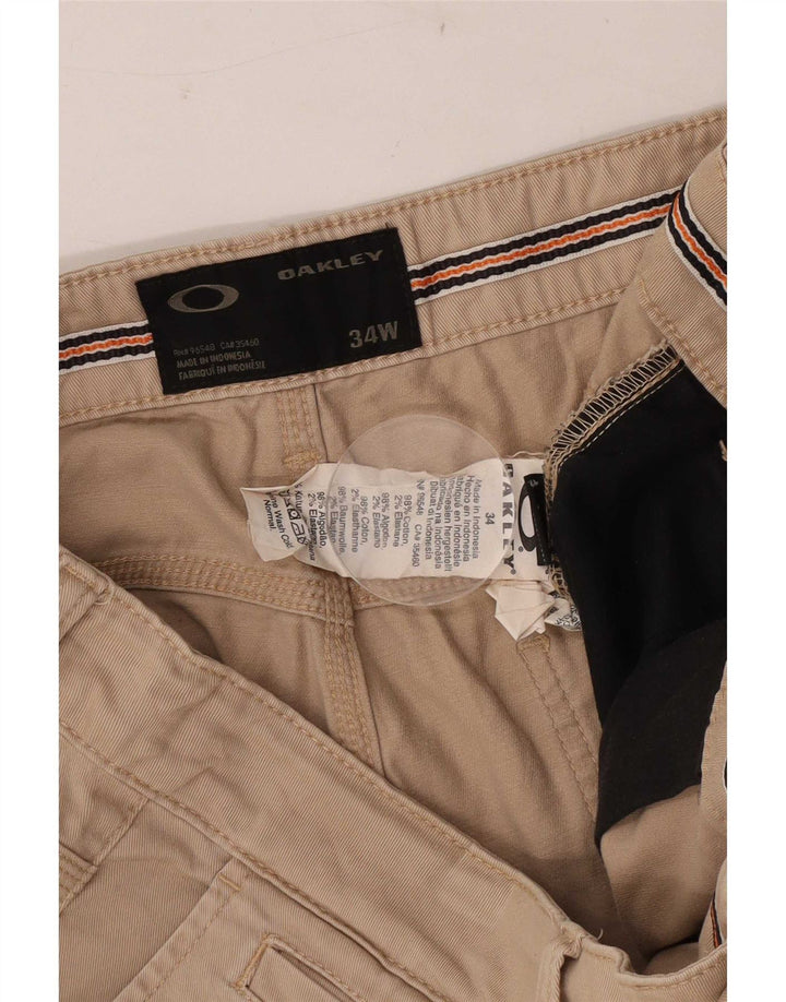 Oakley Pantalones cortos chinos para hombre W34 Algodón beige grande