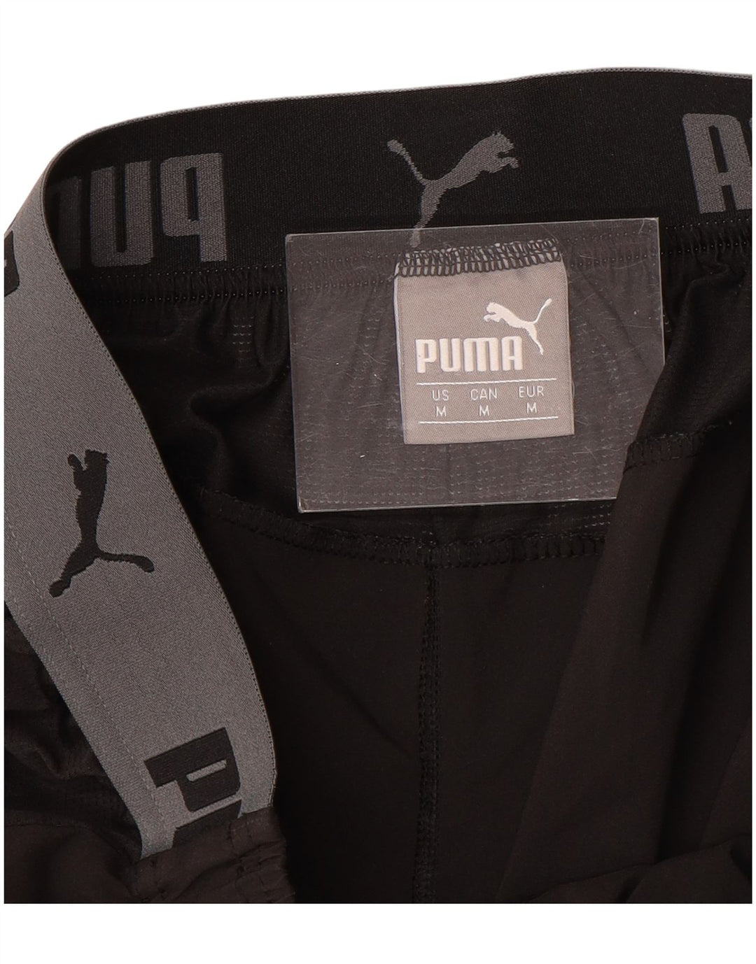 PUMA Shorts deportivos con estampado gráfico para hombre, color negro mediano