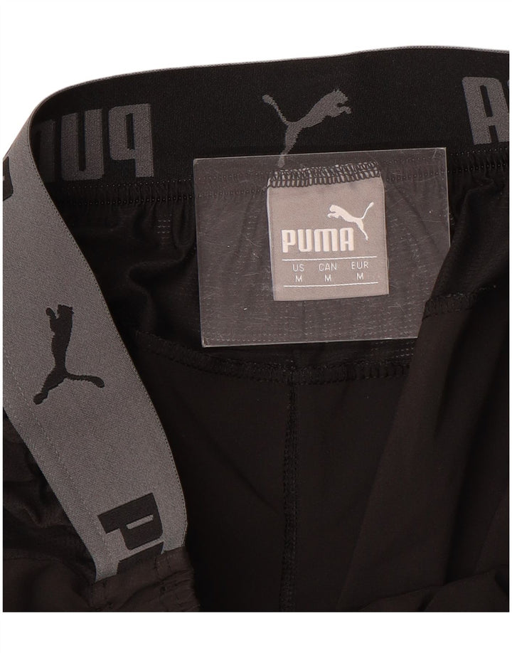 PUMA Shorts deportivos con estampado gráfico para hombre, color negro mediano