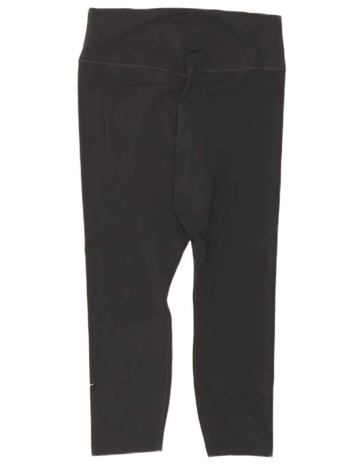 Nike - Leggings capri Dri Fit para mujer, talla M, poliéster negro