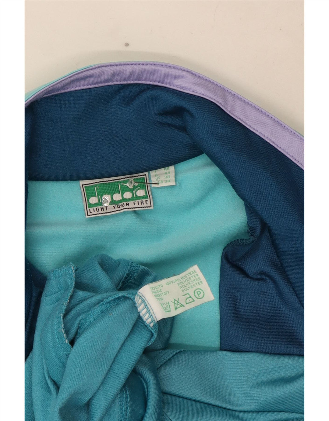 Diadora Chaqueta de chándal con gráfico para hombre ES 38 Verde medio Geométrico