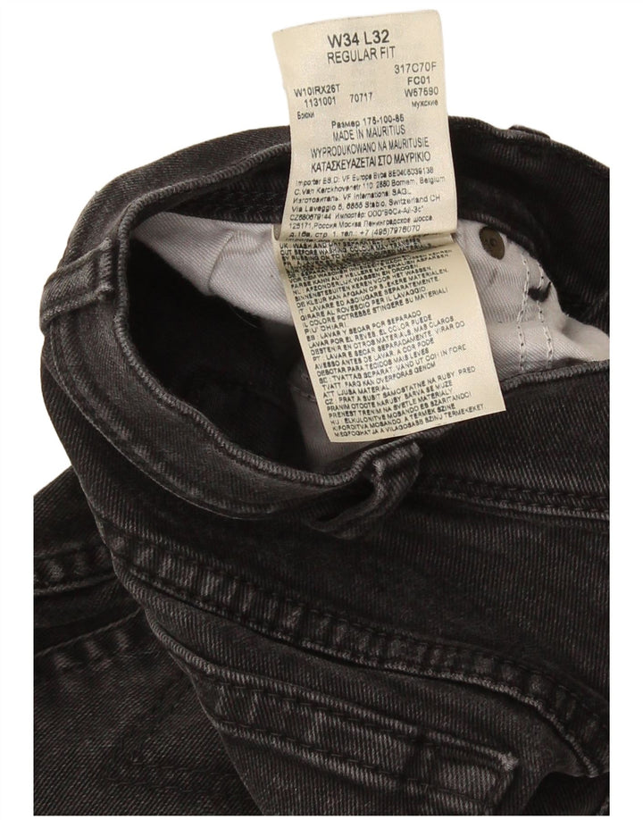 Wrangler Vaqueros rectos de corte regular para hombre W34 L32 Algodón gris
