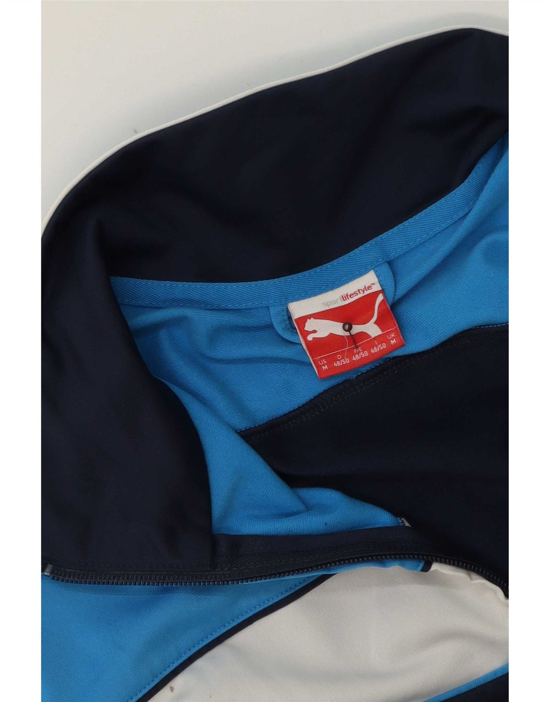 Puma Chaqueta de chándal para hombre con diseño color block en azul marino mediano