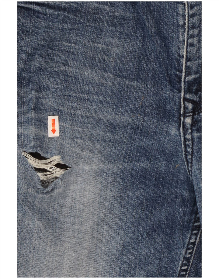 Calvin Klein Jeans desgastados con corte de bota para mujer W33 L29 Algodón azul