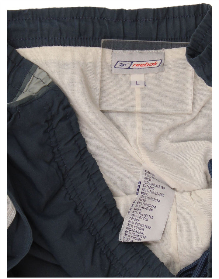 Reebok - Pantalón de chándal para hombre, talla grande, color azul marino, poliéster
