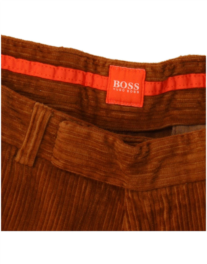 Pantalones de pana con corte bota para hombre HUGO BOSS W34 L36 Marrón