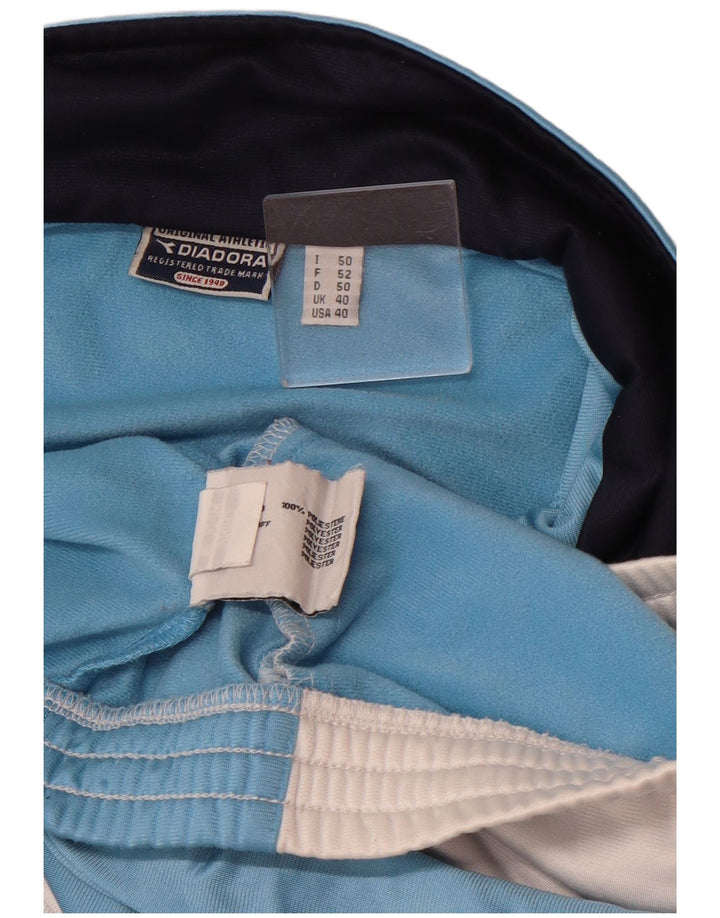 Diadora Chaqueta de chándal para hombre ES 40 Poliéster color block azul medio