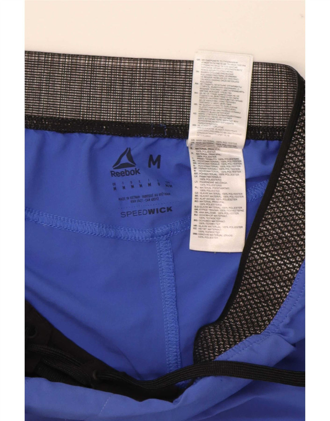 Reebok Shorts deportivos con estampado gráfico en poliéster color azul medio