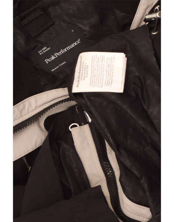 Peak Performance - Chaqueta cortavientos gráfica para mujer (talla 40), color negro