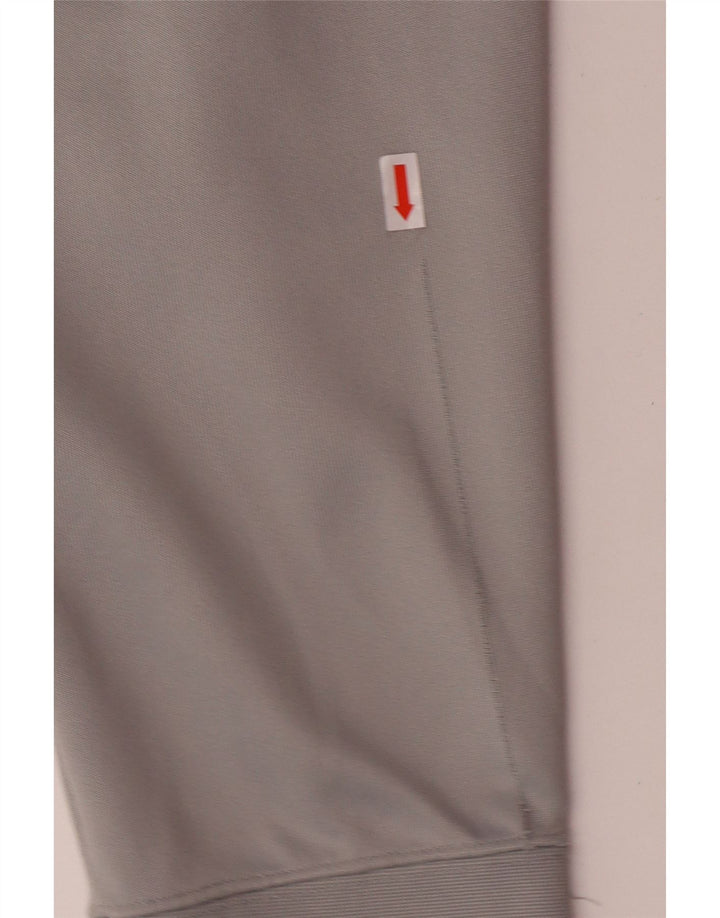 NIKE Hombre Pantalones de Chándal Joggers Gris Medio Poliéster