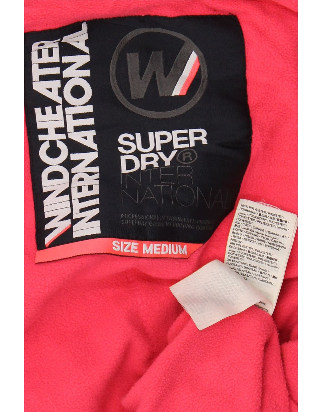 SUPERDRY Chaqueta cortavientos gráfica para mujer UK 44 Azul marino mediano