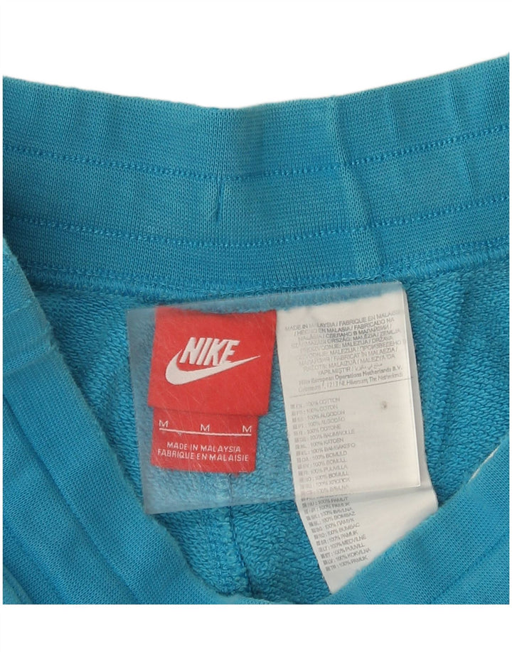 Pantalones cortos deportivos con estampado gráfico de algodón azul medio para hombre Nike