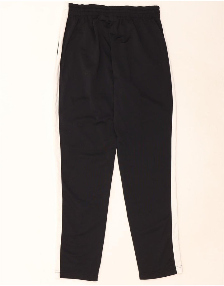 NIKE Hombre Pantalones de chándal Medium Black Colourblock Poliéster