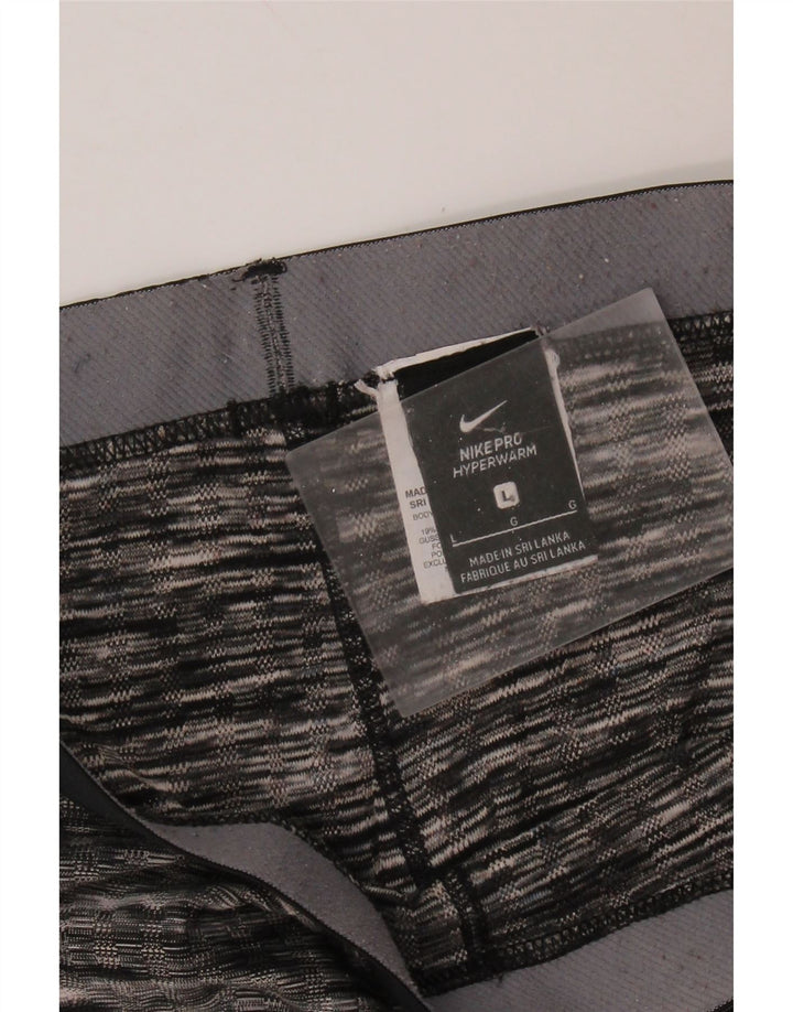 NIKE Leggings gráficos para mujer UK 44 Grande Poliéster a rayas negras