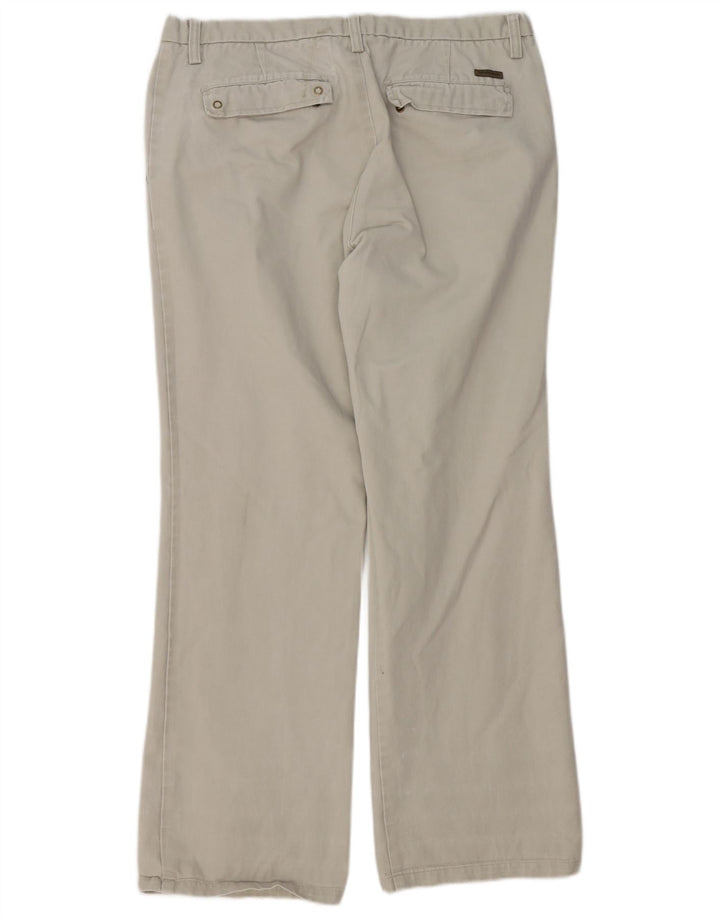 Pantalones chinos con corte de bota para hombre Calvin Klein W34 L32 Beige