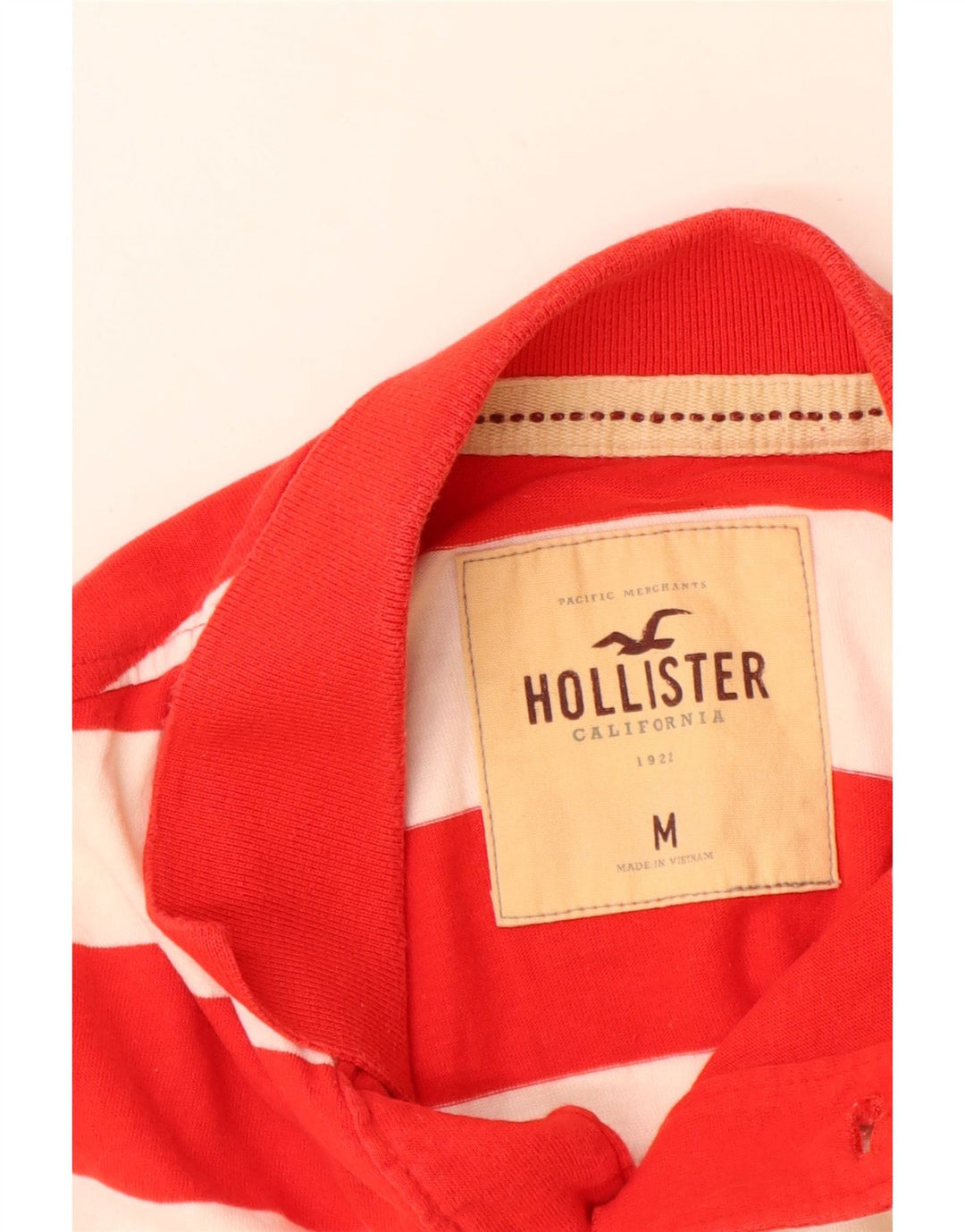 HOLLISTER Polo Hombre Mediano Rayas Rojas