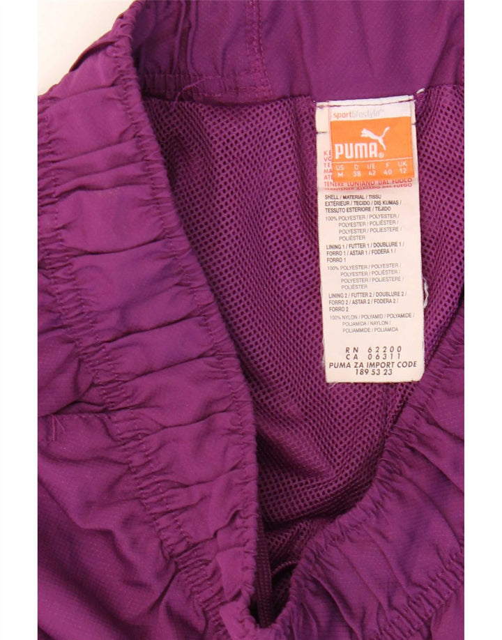 Puma - Pantalones de chándal para mujer, talla 42, color morado medio, poliéster