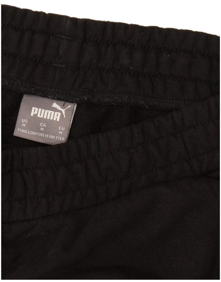 PUMA Pantalones de chándal con estampado gráfico Joggers Medium Black para hombre