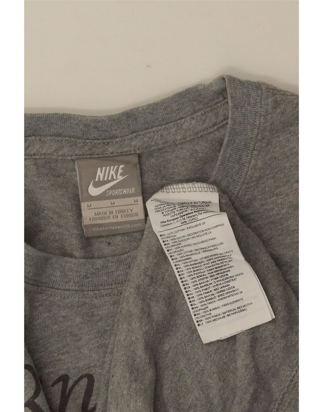 NIKE Camiseta gráfica para hombre Top de algodón gris medio