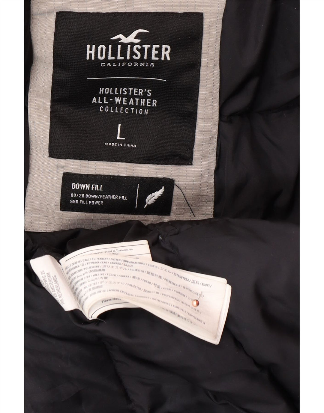 HOLLISTER Chaqueta acolchada con capucha para hombre Reino Unido 40 Poliéster gris grande
