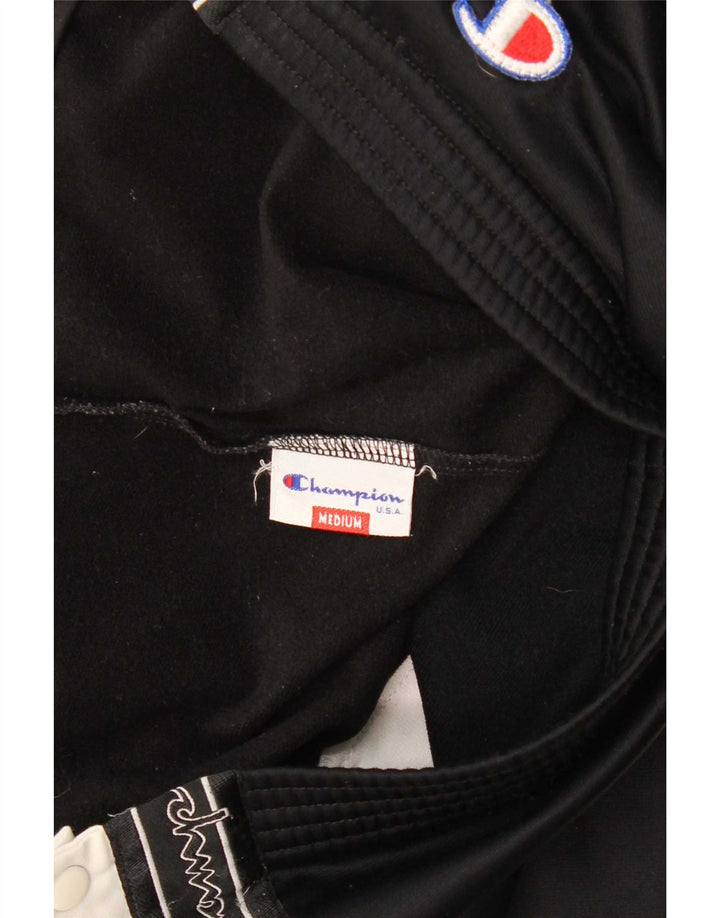 Champion Pantalones De Chándal Estampados En Negro Mediano Colorblock