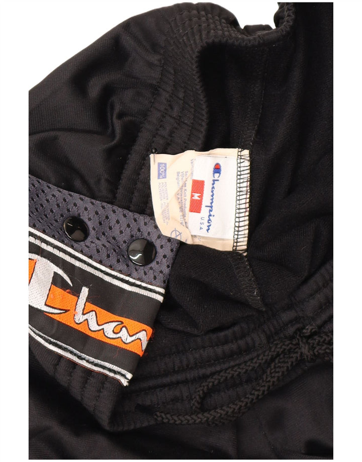 Champion Pantalones De Chándal Estampados En Negro Mediano Colorblock
