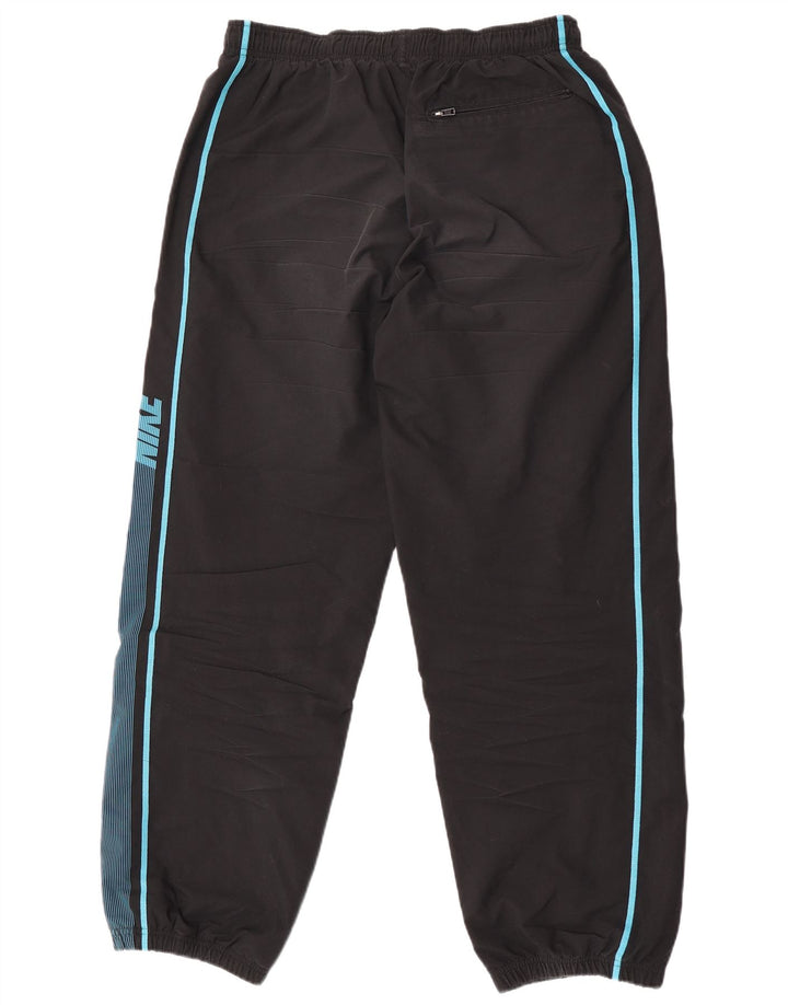 Nike - Pantalones de chándal para hombre, color negro, poliéster