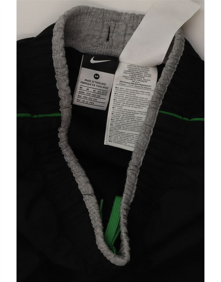 Nike Pantalones de chándal con gráfico para niños 10-11 años Mediano Negro Poliéster