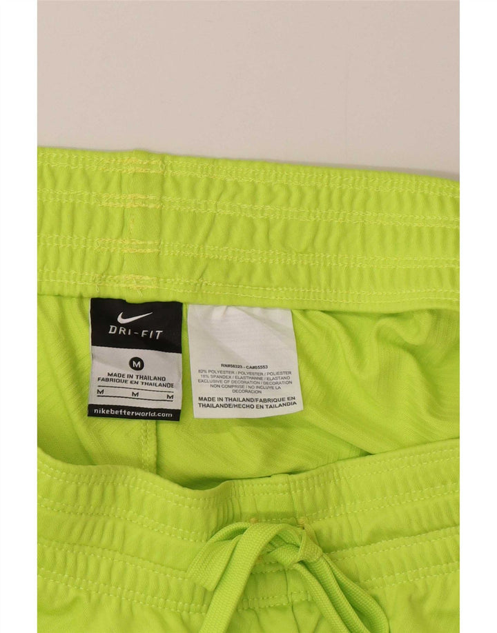 Nike - Pantalones cortos deportivos Dri Fit para mujer, talla 40, poliéster verde medio