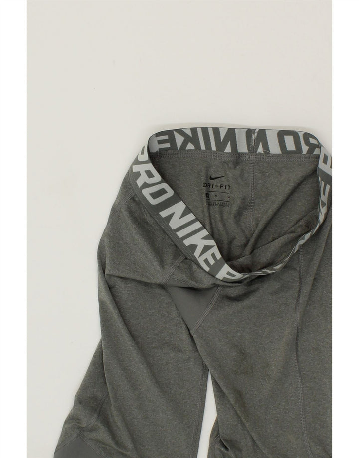 NIKE Boys Graphic Tracksuit Trousers Joggers 10-11 Years Medium Grey Vintage Nike and Second-Hand Nike from Messina Hembry 