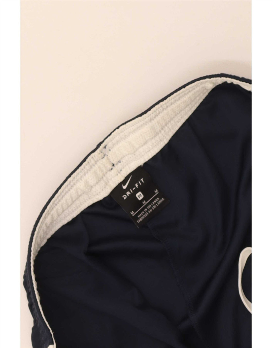 Pantalones cortos deportivos Nike Dri Fit para hombre en color azul marino mediano
