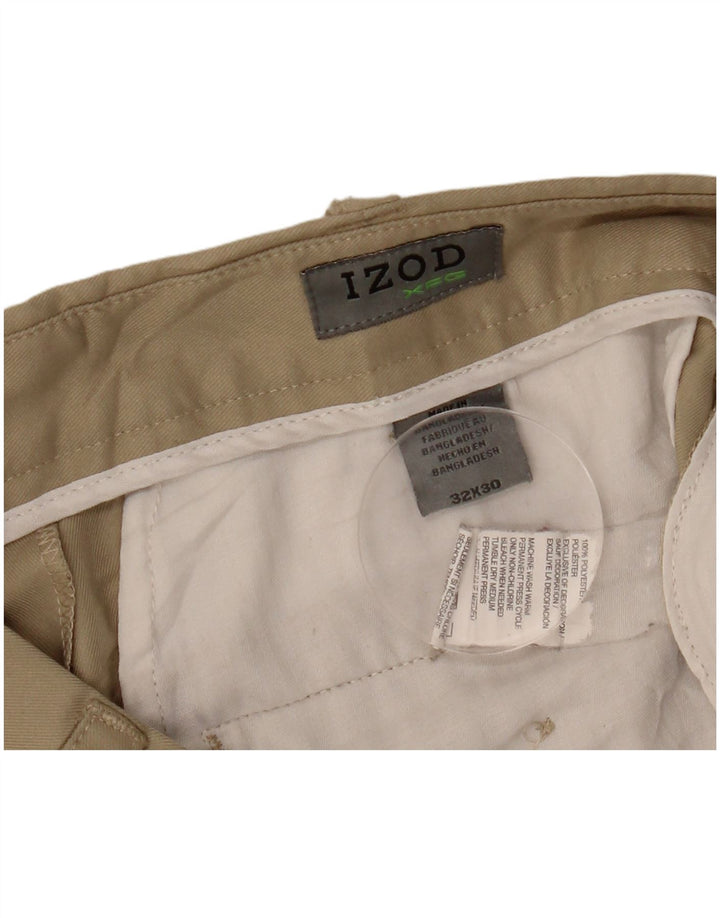 IZOD Pantalón chino con pinzas para hombre W32 L30 Poliéster beige