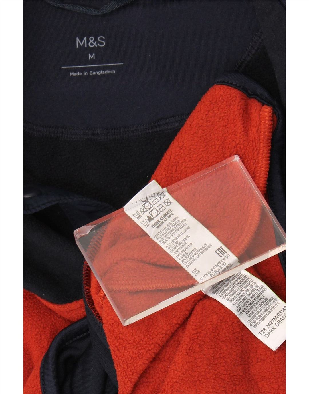 Marks & Spencer Jersey de forro polar con cuello abotonado para hombre color naranja medio