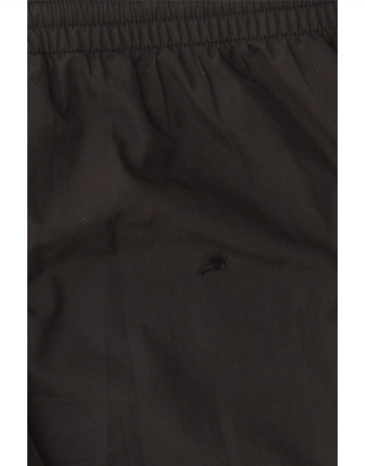 PUMA Pantalones de chándal para niño 15-16 años Negro Poliéster color block