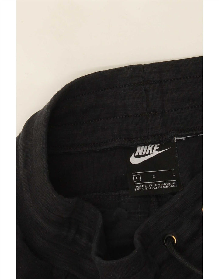 Nike - Pantalones de chándal para mujer, talla 40, color negro