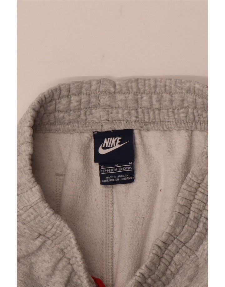 Nike - Pantalones de chándal para niño, 10-11 años, color gris medio jaspeado